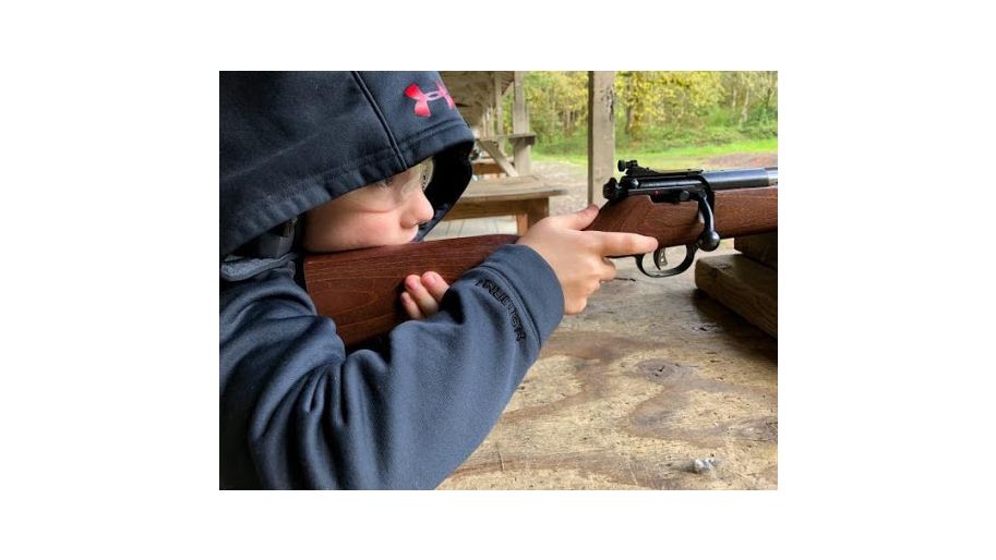Kid Shooting Rifle