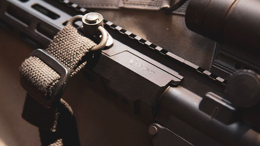 Closeup of a Mission First tactical QD sling attachment on their EXT free-float rail system. 