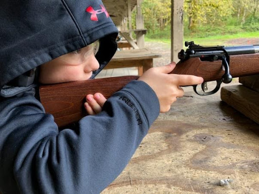 Kid shooting gun